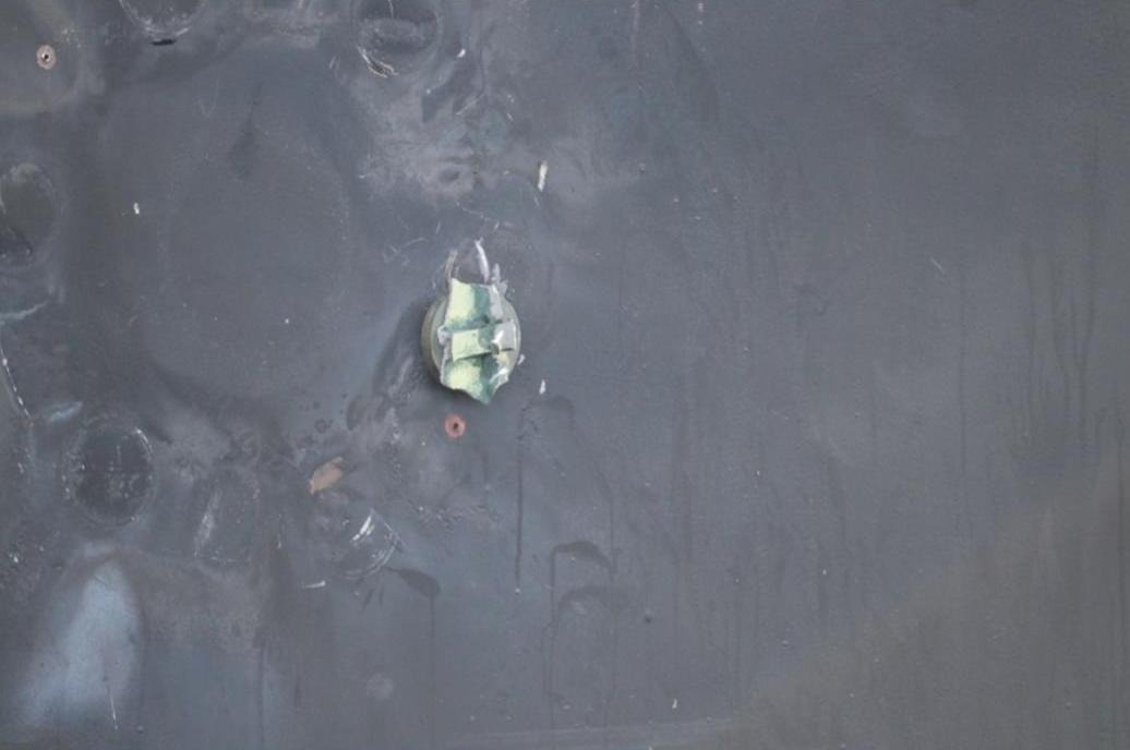 The Pentagon has released new imagery showing damage from an alleged limpet mine on the tanker Kokuka Courageous, along with the remnants of an unexploded mine that was removed from the hull. Another photo shows a handprint, allegedly from the person who removed the mine   