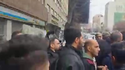 Dismissed workers of Ilam's Arghavan Gostar Petrochemical company rally in front of the offices of the Persian Gulf Holding, demanding policy changes that will ensure employment for locals