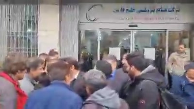 Dismissed workers of Ilam's Arghavan Gostar Petrochemical company rally in front of the offices of the Persian Gulf Holding, demanding policy changes that will ensure employment for locals