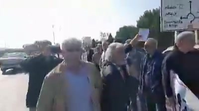 Protest by retirees of the Social Security Organization in Ahvaz. Protesters chant, Enough with the warmongering, our tables are empty