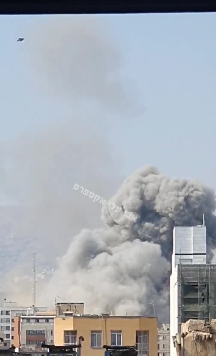 Smokes rising over the Iranian Navy headquarters area in Tehran