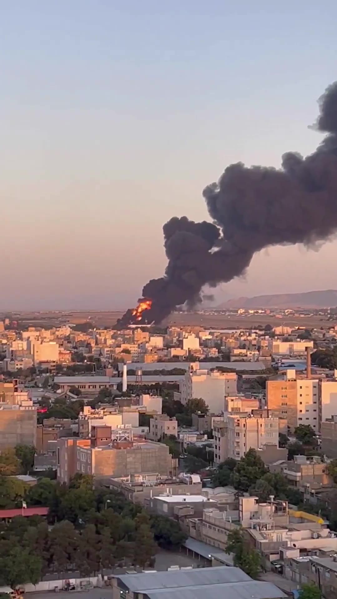 A large fire seen at Mashhad International Airport this afternoon in northeast Iran, after an alleged Israeli airstrike