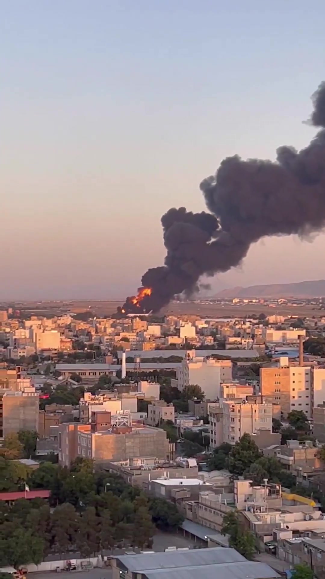 A large fire seen at Mashhad International Airport this afternoon in northeast Iran, after an alleged Israeli airstrike