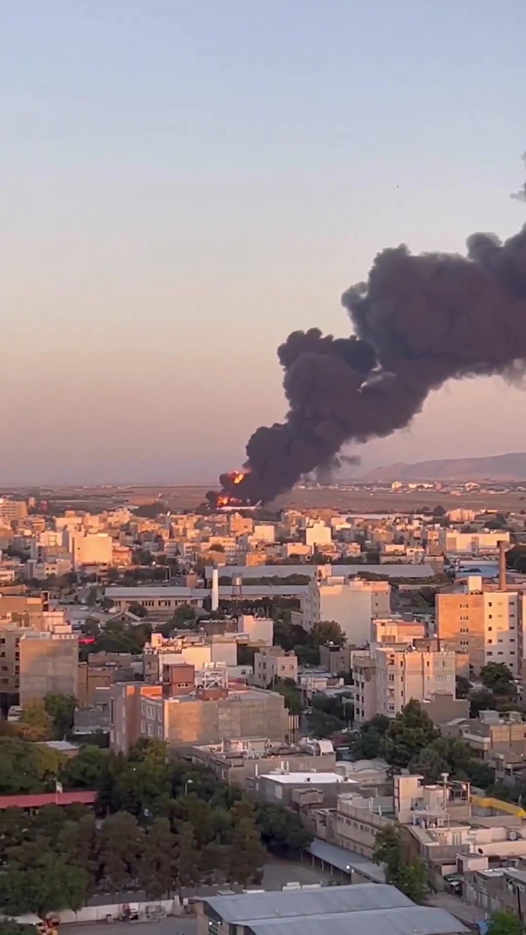 A large fire seen at Mashhad International Airport this afternoon in northeast Iran, after an alleged Israeli airstrike