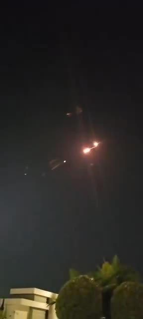 Incoming Iranian ballistic missiles and interceptions seen earlier over Central Israel