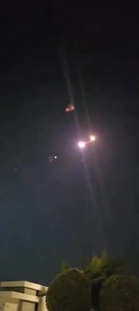 Incoming Iranian ballistic missiles and interceptions seen earlier over Central Israel