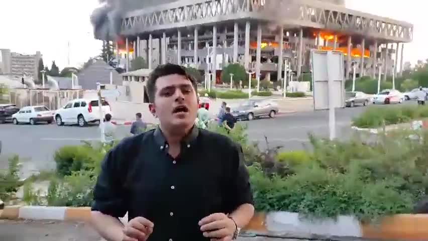 Major fire burns following Israeli airstrikes on Iran's main broadcasting service. The reporter live on air at the time of the airstrike has resumed broadcasting from a different location