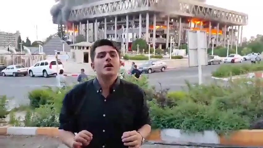 Major fire burns following Israeli airstrikes on Iran's main broadcasting service. The reporter live on air at the time of the airstrike has resumed broadcasting from a different location