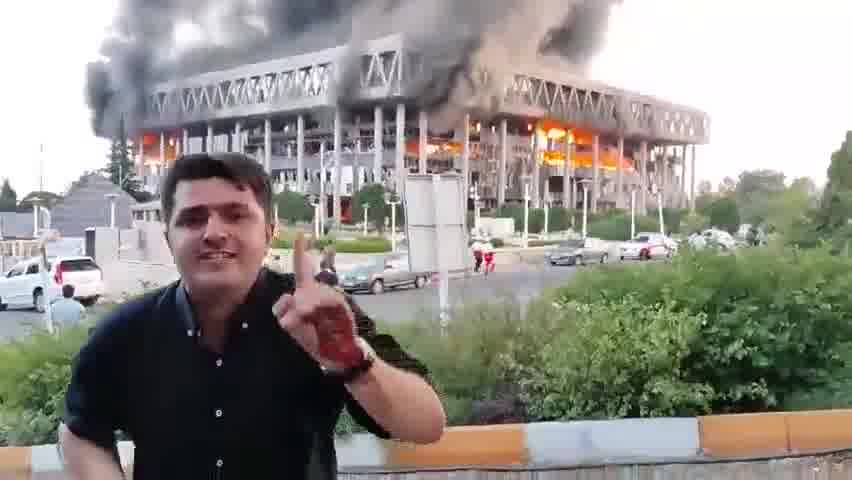 Major fire burns following Israeli airstrikes on Iran's main broadcasting service. The reporter live on air at the time of the airstrike has resumed broadcasting from a different location