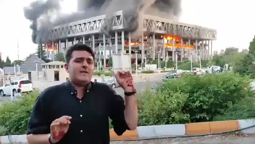 Major fire burns following Israeli airstrikes on Iran's main broadcasting service. The reporter live on air at the time of the airstrike has resumed broadcasting from a different location