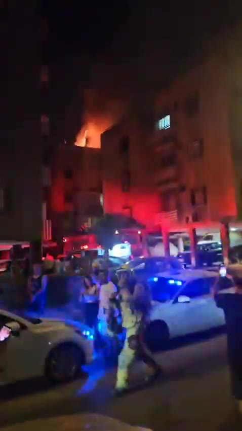 A fire broke out on the roof of a building in central Israel after debris from an interceptor fell during the latest Iranian missile attack