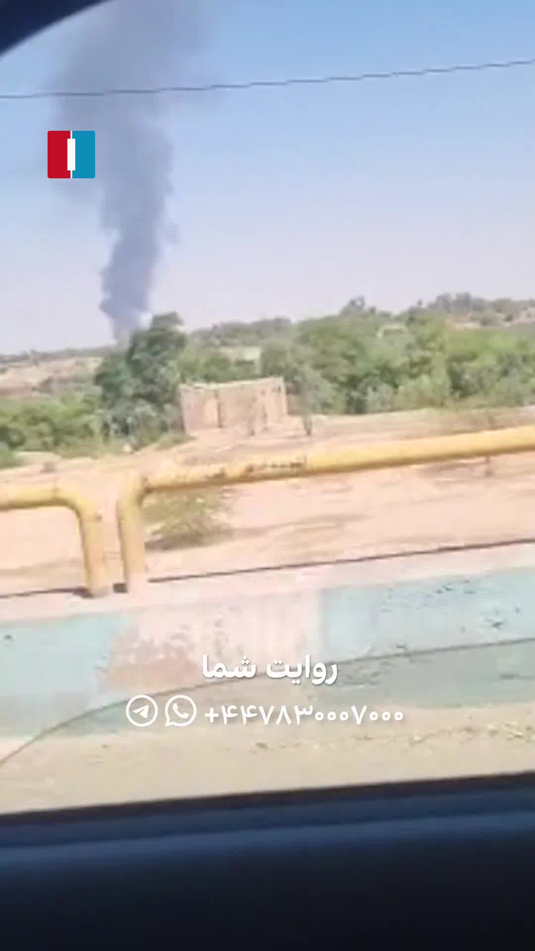 A column of black smoke rising over the city of Dezful, southwestern Khuzestan province. Eyewitnesses say the smoke appears to be coming from the Vahdati Airbase (4th Tactical Fighter Base)