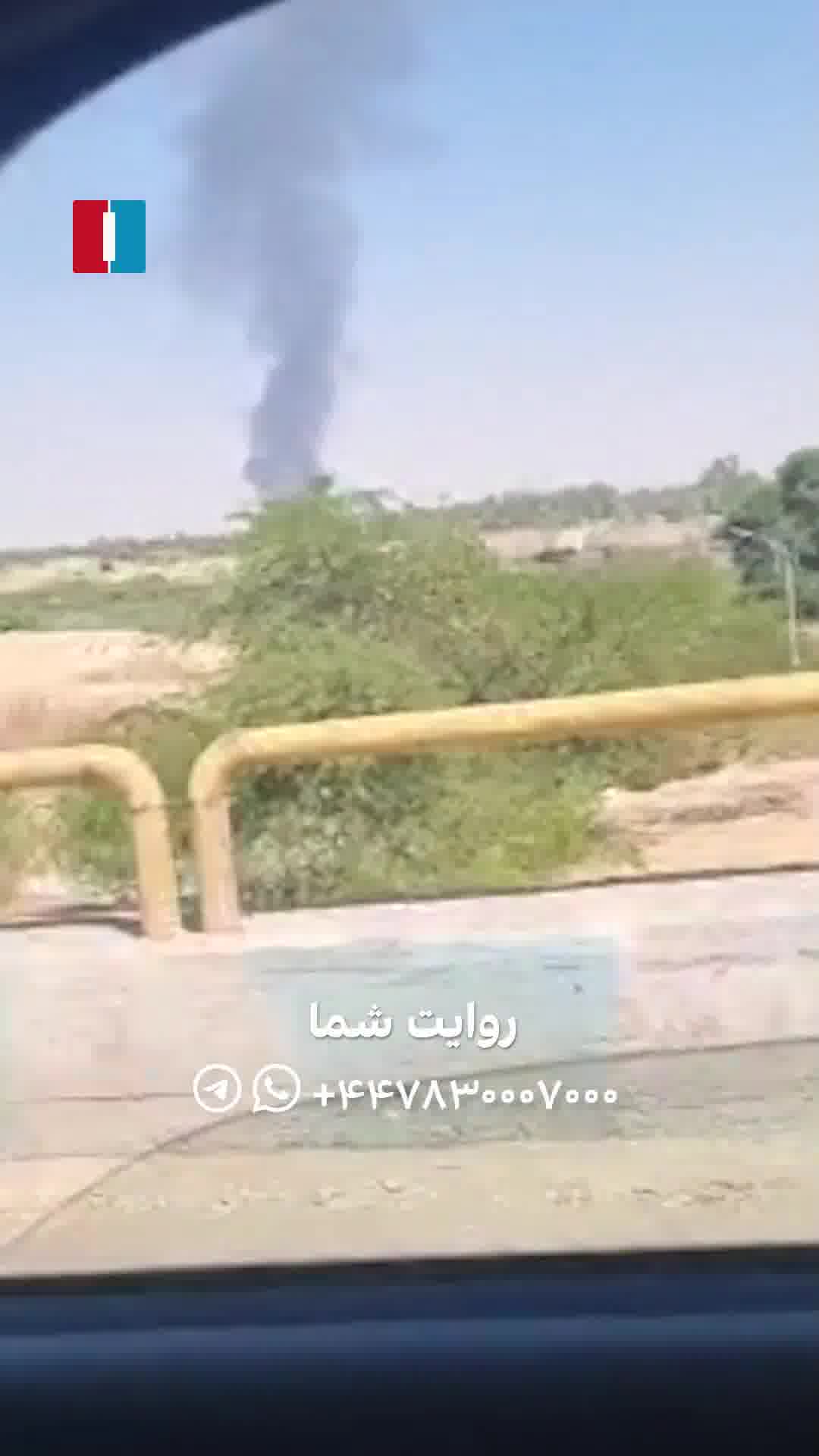 A column of black smoke rising over the city of Dezful, southwestern Khuzestan province. Eyewitnesses say the smoke appears to be coming from the Vahdati Airbase (4th Tactical Fighter Base)