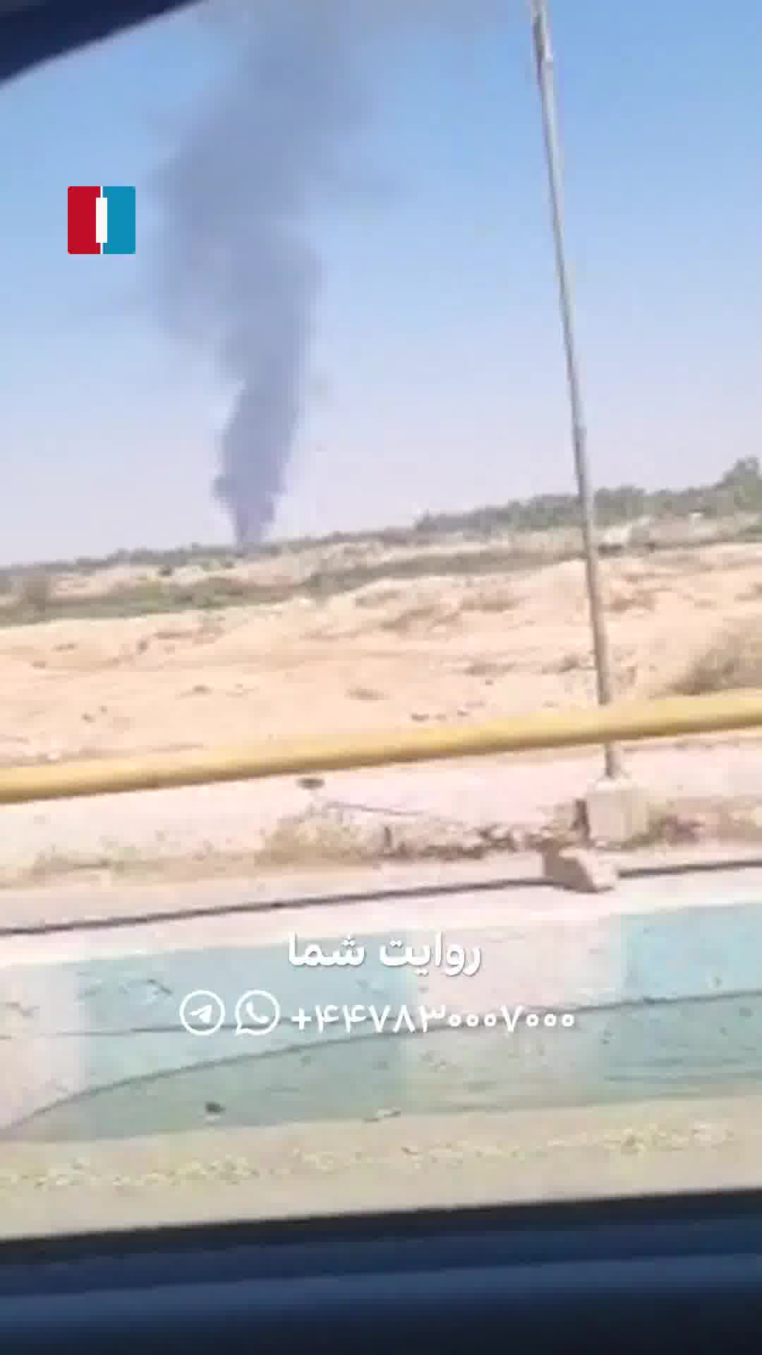 A column of black smoke rising over the city of Dezful, southwestern Khuzestan province. Eyewitnesses say the smoke appears to be coming from the Vahdati Airbase (4th Tactical Fighter Base)