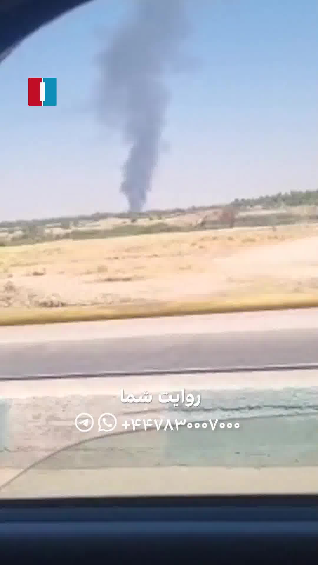 A column of black smoke rising over the city of Dezful, southwestern Khuzestan province. Eyewitnesses say the smoke appears to be coming from the Vahdati Airbase (4th Tactical Fighter Base)