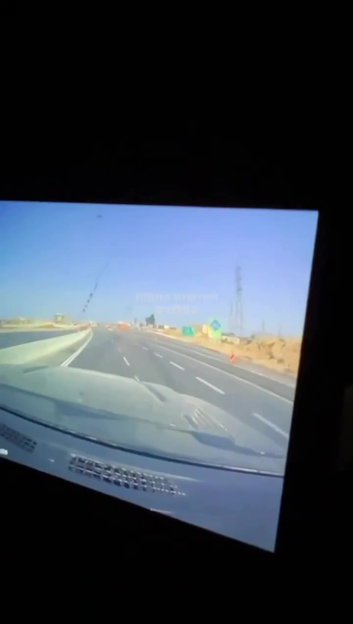 Dashcam footage showing the impact of an Iranian ballistic missile earlier near a power station in Ashdod, Southern Israel