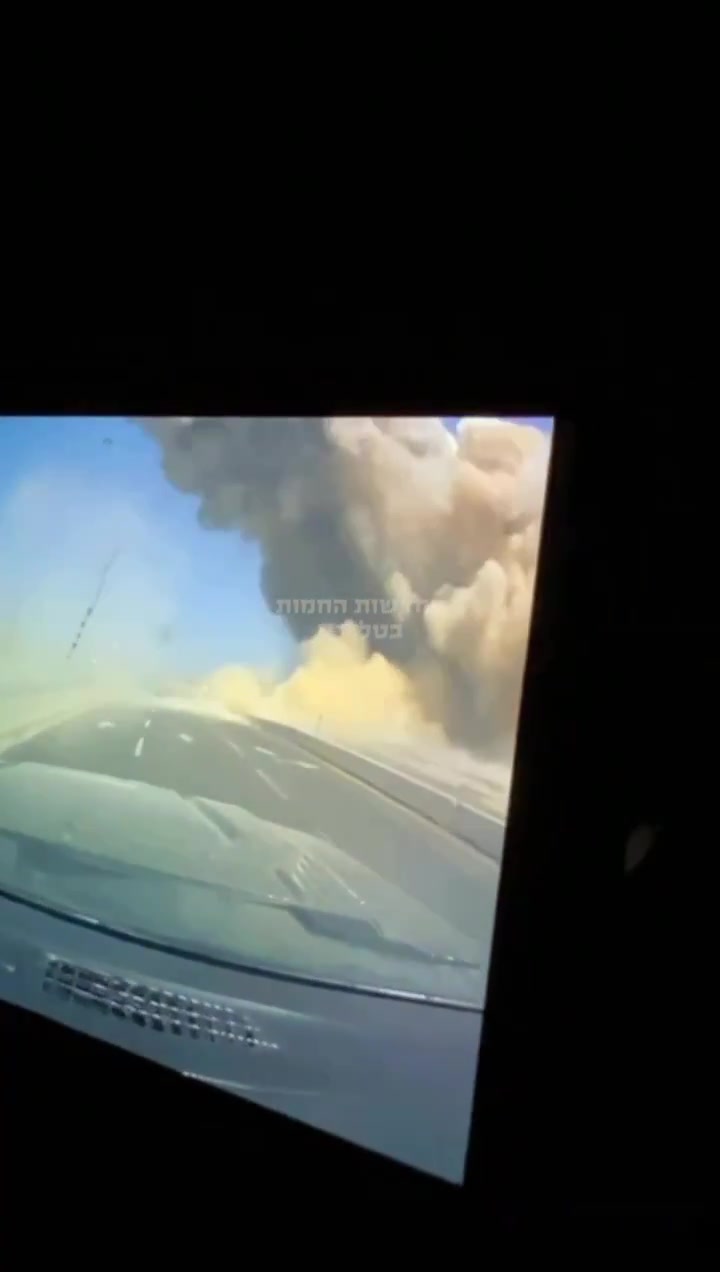 Dashcam footage showing the impact of an Iranian ballistic missile earlier near a power station in Ashdod, Southern Israel