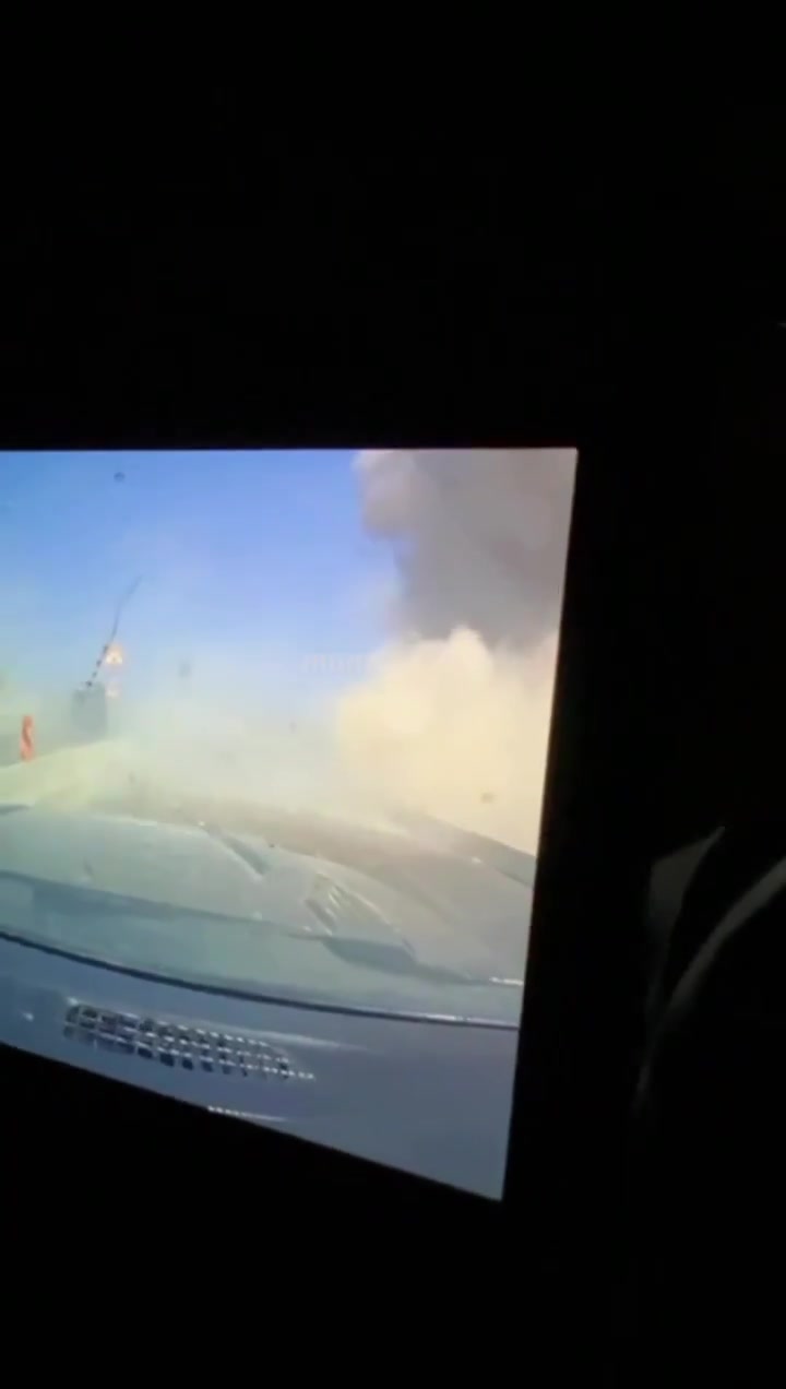 Dashcam footage showing the impact of an Iranian ballistic missile earlier near a power station in Ashdod, Southern Israel