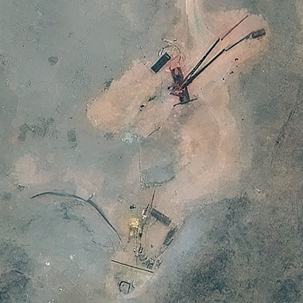 A lot going on at Fordow TODAY. Ventilation shaft and bomb penetration holes have been filled up. nn1. Large crane near large excavator working at old tunnel entrance. 2. Truck mounted borehole drilling rig parked nearby. 3. Trucks near tarmac road being filled up by bulldozer.