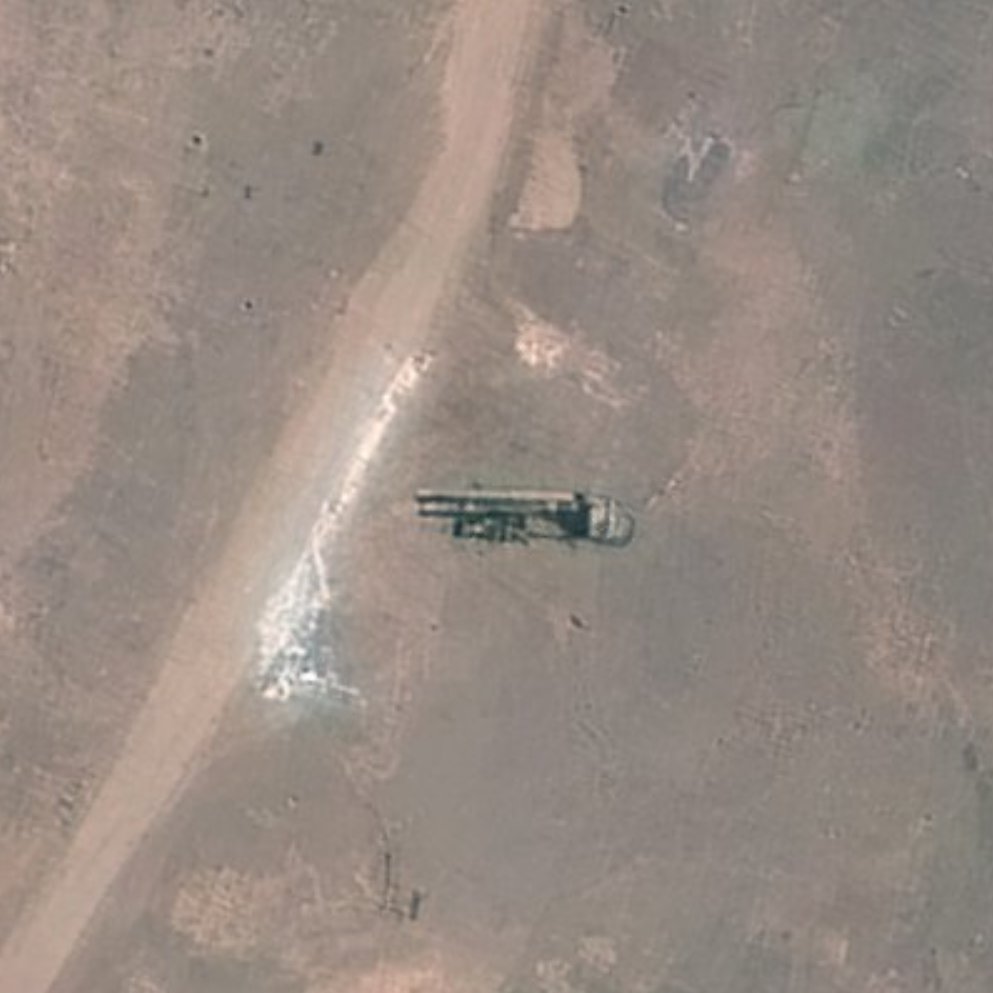 A lot going on at Fordow TODAY. Ventilation shaft and bomb penetration holes have been filled up. nn1. Large crane near large excavator working at old tunnel entrance. 2. Truck mounted borehole drilling rig parked nearby. 3. Trucks near tarmac road being filled up by bulldozer.