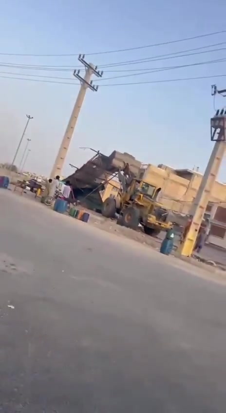Iranshahr, southeast Iran: Security forces and municipal authorities used a loader to demolish the makeshift stalls and business sites of Baluch street vendors at Aminifard roundabout