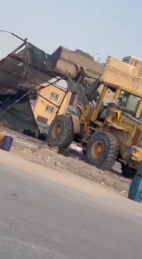 Iranshahr, southeast Iran: Security forces and municipal authorities used a loader to demolish the makeshift stalls and business sites of Baluch street vendors at Aminifard roundabout