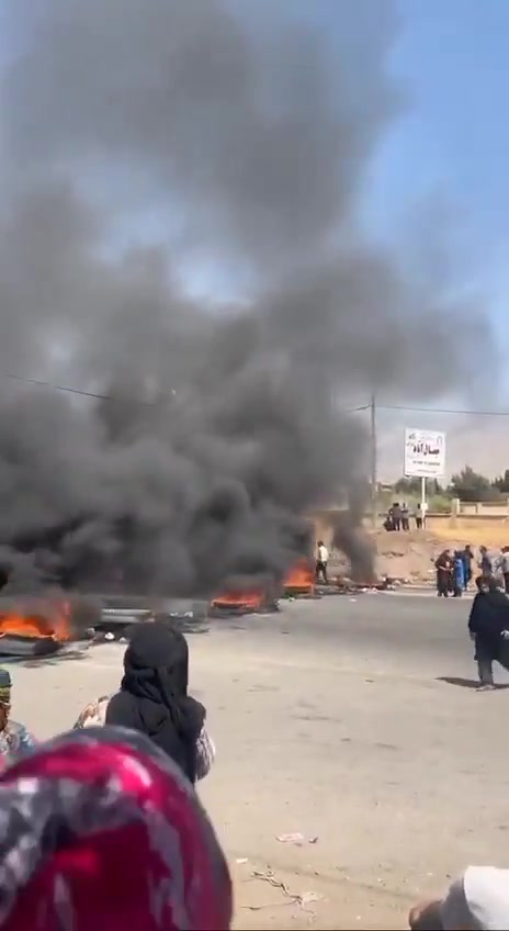 Anti-government protests over water shortages in Iran continue to spread, as demonstrators in Lowshan City block the entrance to Gilan province with burning tires