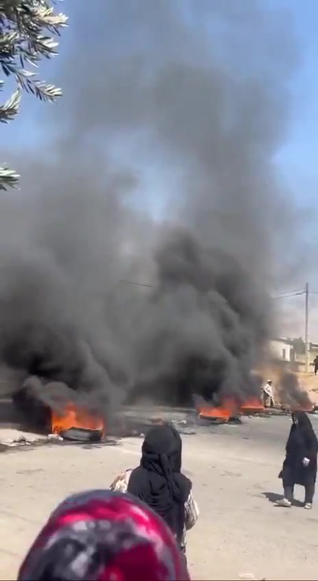Anti-government protests over water shortages in Iran continue to spread, as demonstrators in Lowshan City block the entrance to Gilan province with burning tires
