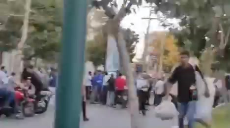 Borujerd, western Iran: Locals rally in front of the electricity department to protest unplanned electricity outages. 