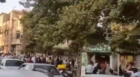 Borujerd, western Iran: Locals rally in front of the electricity department to protest unplanned electricity outages. 