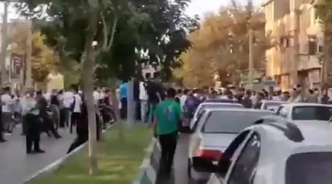 Borujerd, western Iran: Locals rally in front of the electricity department to protest unplanned electricity outages. 