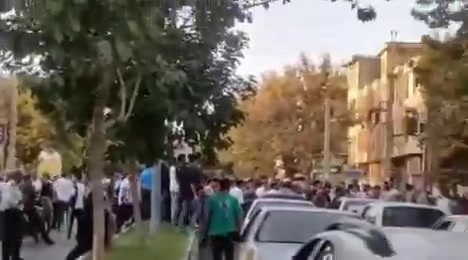 Borujerd, western Iran: Locals rally in front of the electricity department to protest unplanned electricity outages. 