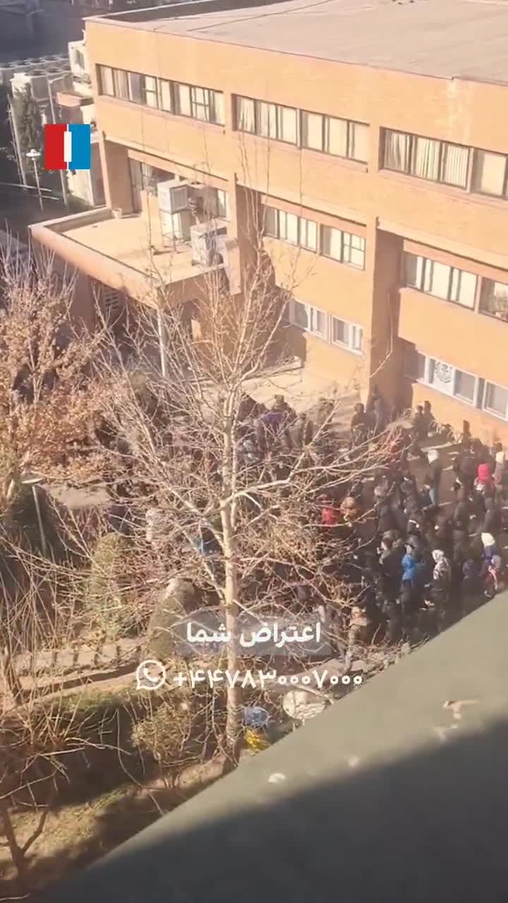 Videos received by Iran International on Tuesday showed student protest gatherings at several major Tehran universities. At Sharif University, students chanted “Neither Gaza nor Lebanon, my life for Iran,” as campus protests widened amid ongoing unrest