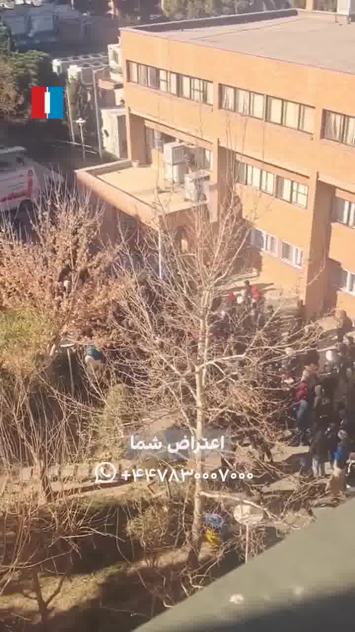 Videos received by Iran International on Tuesday showed student protest gatherings at several major Tehran universities. At Sharif University, students chanted “Neither Gaza nor Lebanon, my life for Iran,” as campus protests widened amid ongoing unrest