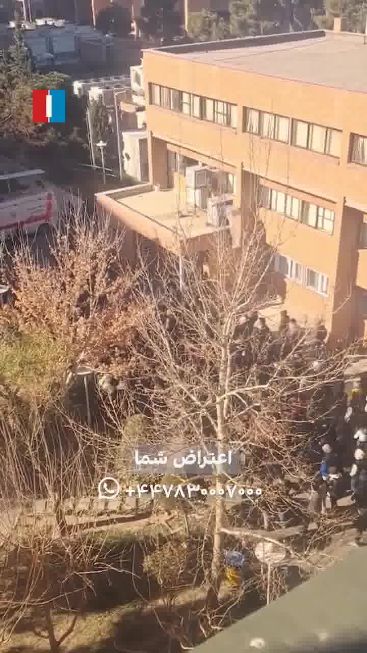 Videos received by Iran International on Tuesday showed student protest gatherings at several major Tehran universities. At Sharif University, students chanted “Neither Gaza nor Lebanon, my life for Iran,” as campus protests widened amid ongoing unrest