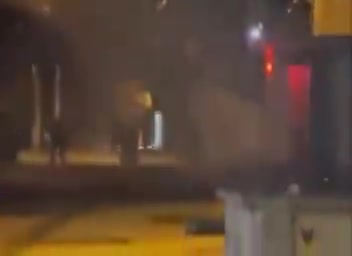 Direct clashes between Iranian protestors and regime security forces in the streets of Asadabad