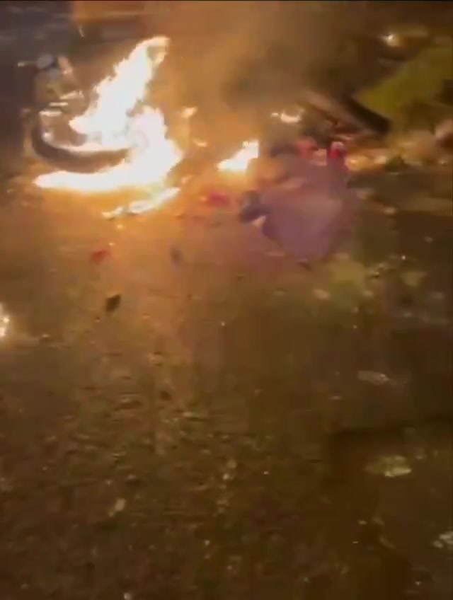 Rasht, N Iran Social media video of protesters setting fire to a motorcycle belonging to security forces who opened fire on them