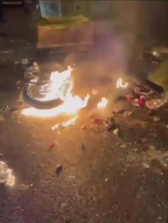 Rasht, N Iran Social media video of protesters setting fire to a motorcycle belonging to security forces who opened fire on them