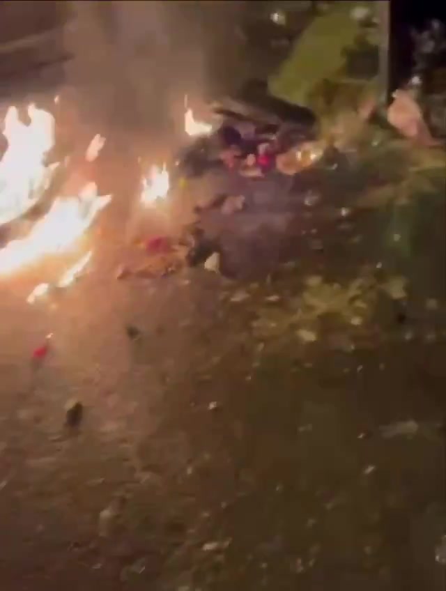 Rasht, N Iran Social media video of protesters setting fire to a motorcycle belonging to security forces who opened fire on them