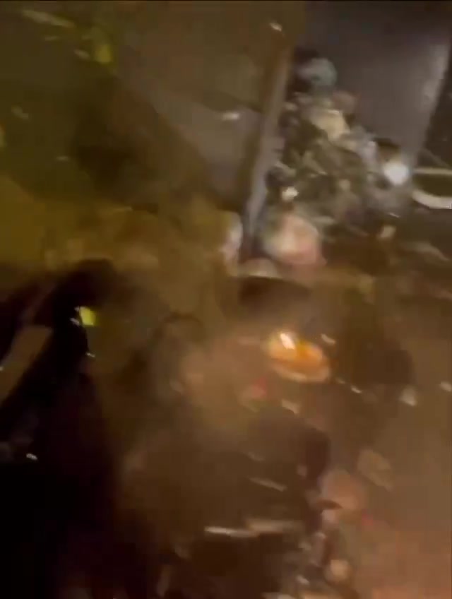 Rasht, N Iran Social media video of protesters setting fire to a motorcycle belonging to security forces who opened fire on them