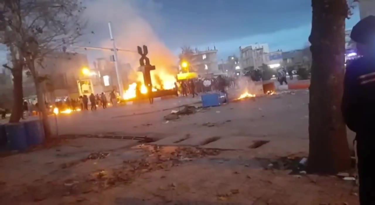 Protestors ignite fires in the streets of Kuhdasht, western Iran