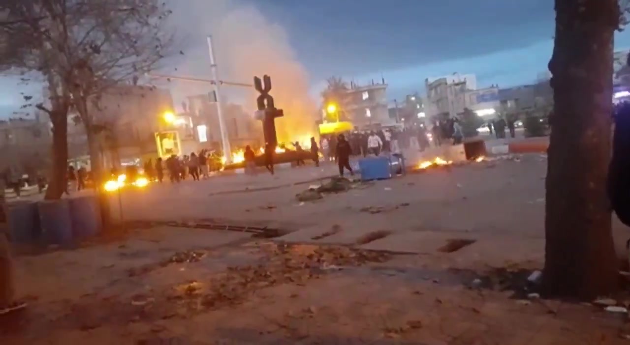 Protestors ignite fires in the streets of Kuhdasht, western Iran
