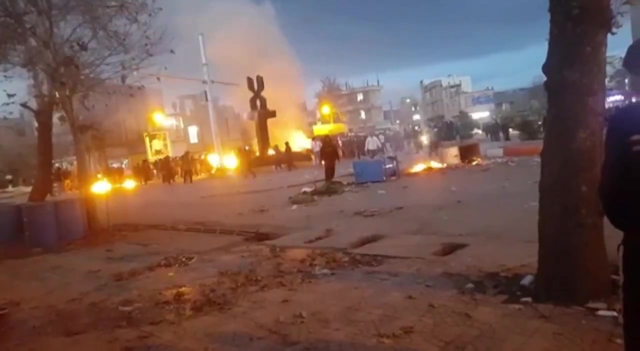 Protestors ignite fires in the streets of Kuhdasht, western Iran