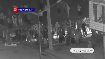 Iranian state media publish footage they claim shows armed protesters firing at security guards in Kermanshah