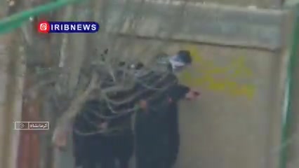 Iranian state media publish footage they claim shows armed protesters firing at security guards in Kermanshah