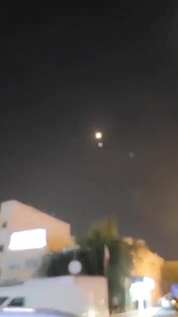 Bahraini air defenses are intercepting several Iranian missiles over Manama