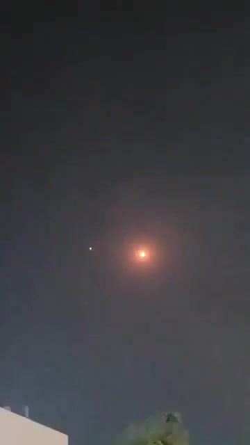 Bahraini air defenses are intercepting several Iranian missiles over Manama