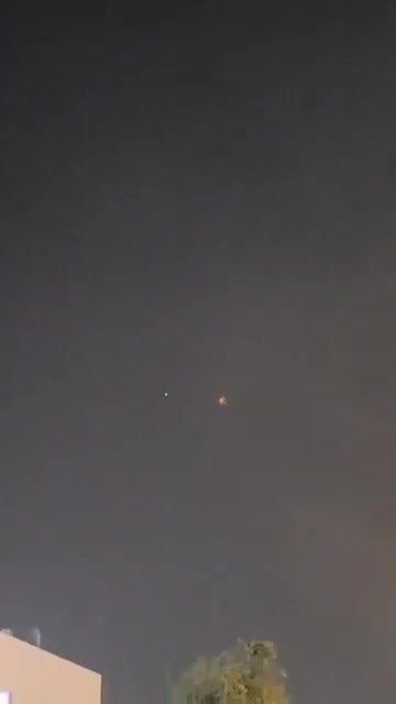Bahraini air defenses are intercepting several Iranian missiles over Manama