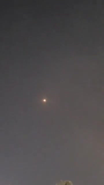 Bahraini air defenses are intercepting several Iranian missiles over Manama
