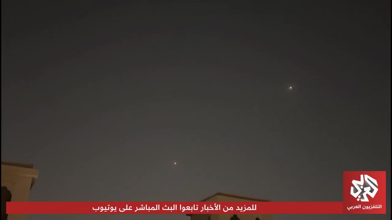 Footage shows air defenses intercepting Iranian missiles in Qatari airspace.